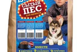 Dry extruded complete food for puppies