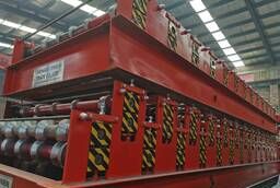 Roll forming mill for roofing corrugated board