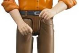 A figurine of a man brown jeans,