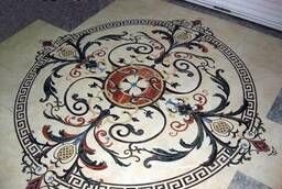 Panel from granite mosaic inlaid, different sizes of chips