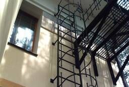 Vertical metal stairs. Evacuation ladders