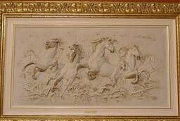 Running horses bas-relief