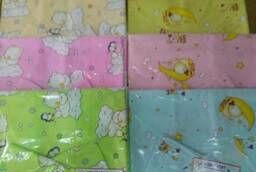 Diapers, kpb for a baby cot. yu pillows. ..