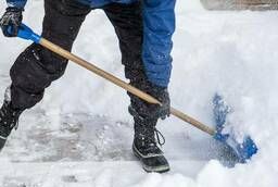 Clearing snow from areas manually