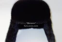Winter. Hat with earflaps for men made of mink fur and leather.