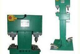 Double-sided hydraulic press with an electric drive
