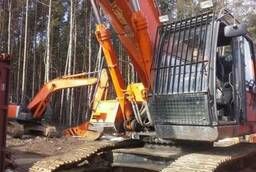 Dismantling of Second-hand spare parts of excavators. Repurchase of used excavators
