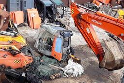 Dismantling of Second-hand spare parts of excavators. Repurchase of used excavators
