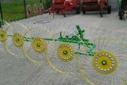 5-wheel rake mounted on a tractor (Poland)
