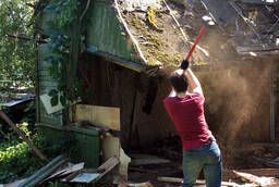 Demolition of sheds with garbage disposal