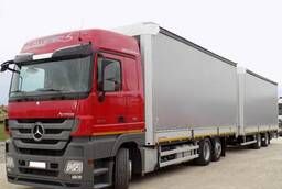Услуги грузовых перевозок автопоездом (тент) - 20 тонн 120м3