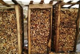 Hardwood firewood stacked on pallets