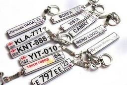 Printing numbers and inscriptions on key rings