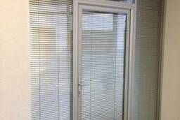 Interior partition with built-in blinds