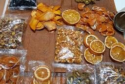 Dried fruits in assortment. Mandarin. Persimmon. Kiwi. Feijoa