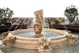 Fountain made of natural stone beige granite