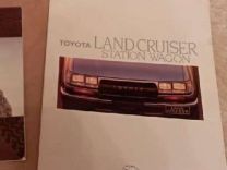 Рекламные буклеты LR Defender и Toyota LC sw