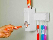 Диспенсер (дозатор) зубной пасты новый