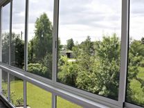 Остекление балконов раздвижными алюминиевыми рамам