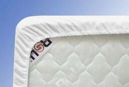 Waterproof mattress topper with an elastic band